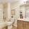 Stylish, modern bathrooms with curved shower curtain rods